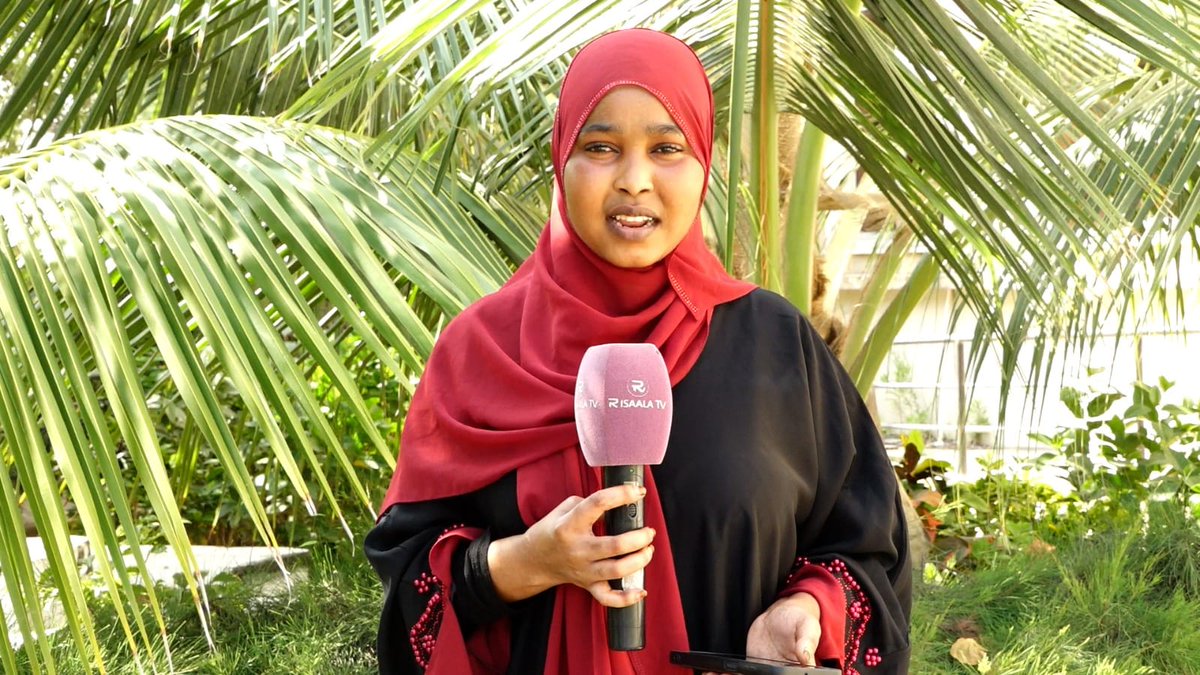 NISA plainclothed agents drag journalist Shukri Abbi by her veil, and brandish a pistol. She was brutally attacked while covering a protest against home demolitions in Mogadishu, leaving her bruised and battered—no arrests yet.